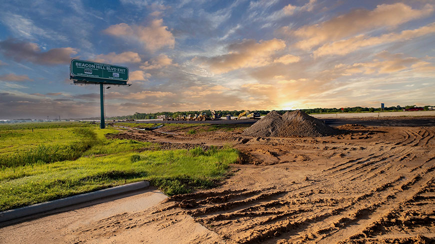 A photo of the Beacon Hill Exit sign off of HWY 290